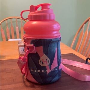HydroJug Coral Water Bottle with carrying bag cover